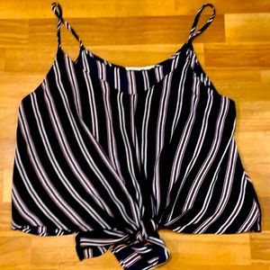 A purple pink and white top.